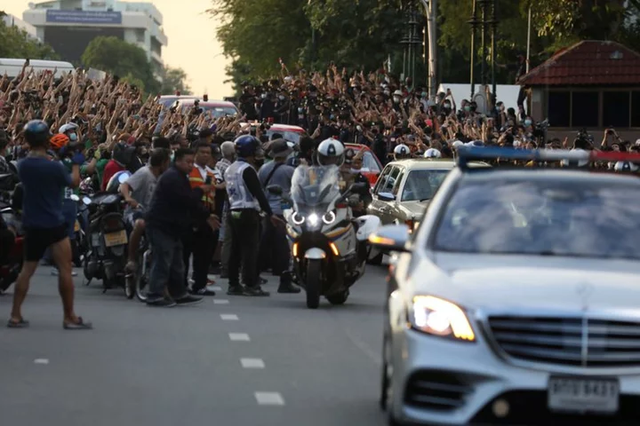 Thai protesters acquitted over run-in with queen's motorcade
