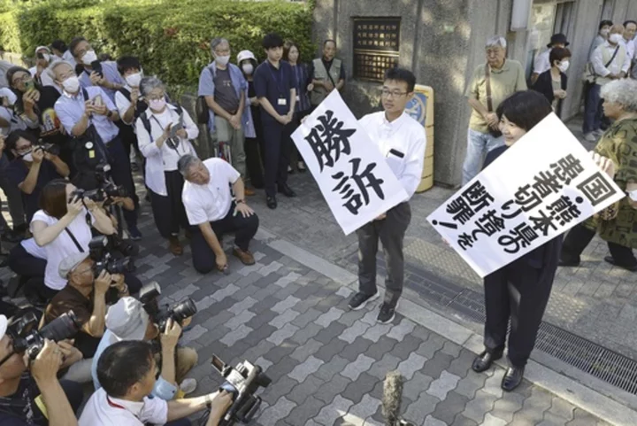 Japan's court recognizes more victims of Minamata mercury poisoning and awards them compensation