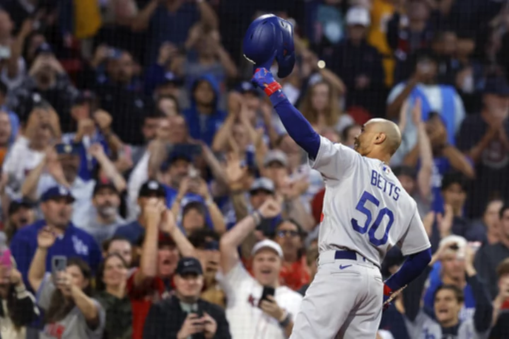 Betts gets ovation, scores twice against former team, Freeman has 4 hits as Dodgers beat Red Sox 7-4