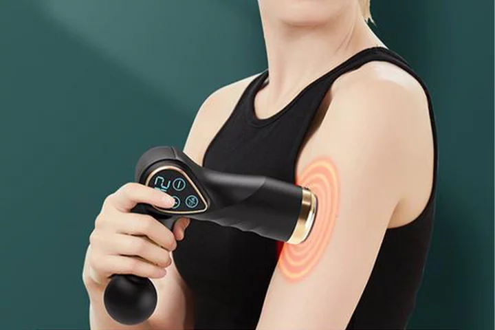 Get this heated massage gun for just $50