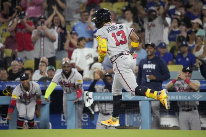 Acuña hits grand slam to become first player with 30 homers and 60 stolen bases in a season