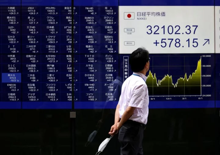 Nikkei closes above 33,000 for the first time in 33 years