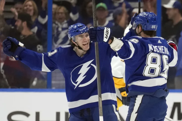 Johansson wins in debut, Paul has 2 power-play goals and Lightning beat Predators 5-3