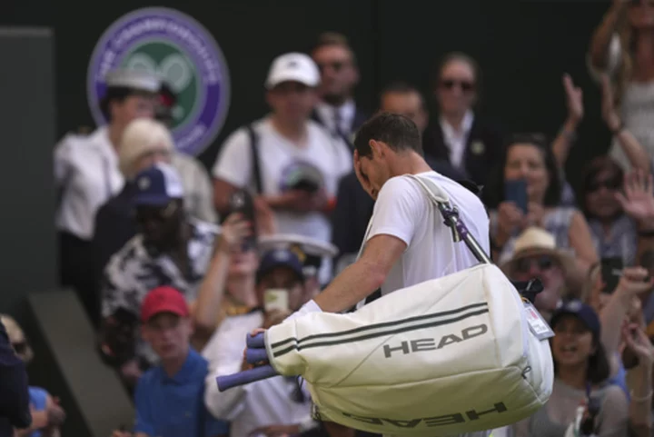 Andy Murray exits Wimbledon with uncertainty after a 5-set, 2-day loss to Stefanos Tsitsipas