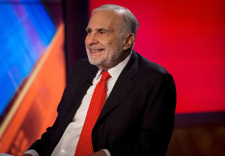 Carl Icahn's firm cuts dividend by 50% after short-seller attack, shares slump