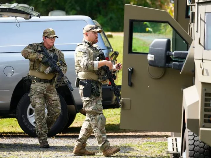 Police call for residents to stay indoors after escaped Pennsylvania killer is spotted again, this time possibly with weapon, officials say