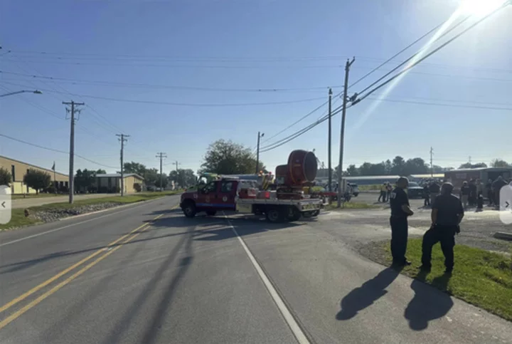 A truck crash in Illinois kills 5, seriously injures 5 and forces an evacuation due to ammonia leak