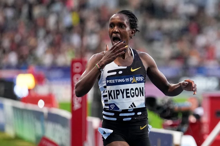 Kenya rewards runner Kipyegon with $35,000 and house for breaking 2 world records