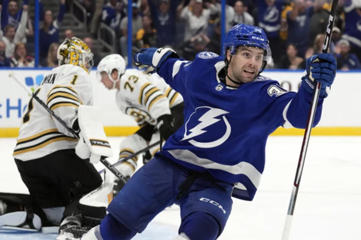 Hagel scores in OT as Lightning beat Eastern Conference-leading Bruins 5-4