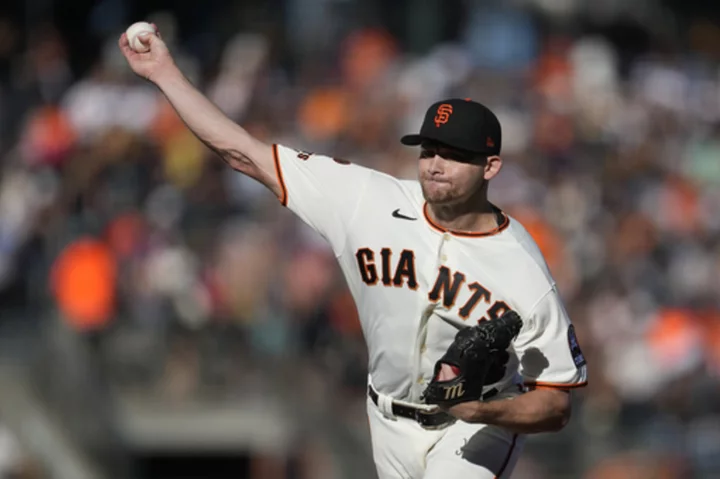 Giants complete 3-game sweep of Rockies behind rookie pitcher's 1st MLB win