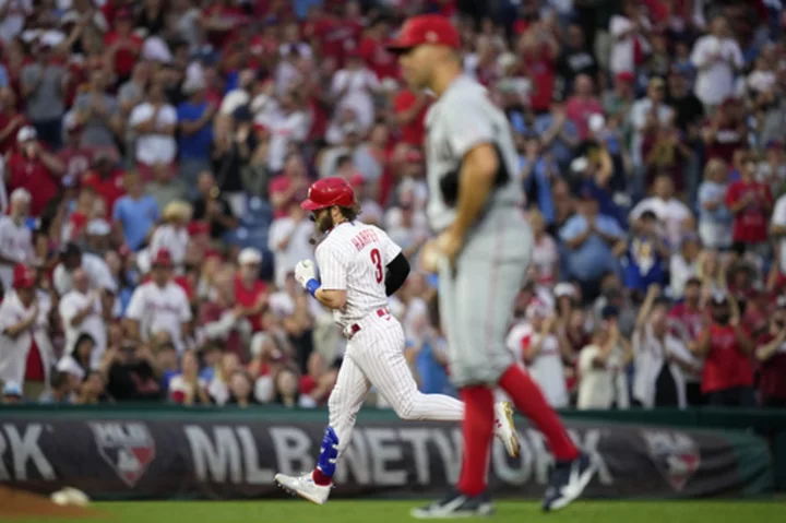 Harper hits career homer No. 299, Phillies slug 5 homers in 12-7 win over Ohtani, Angels