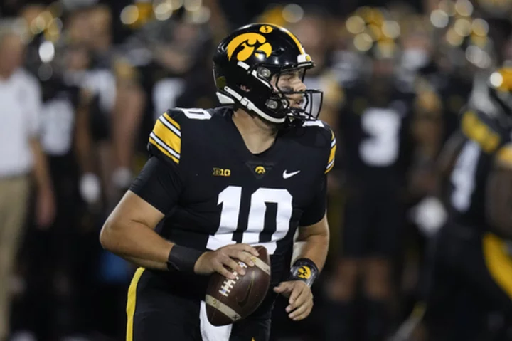 Purdue visits Iowa for key Big Ten West game;.QB Deacon Hill to make his first start for Hawkeyes