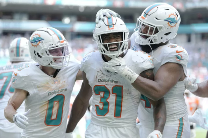 Tagovailoa, Dolphins score most points by NFL team since 1966 in 70-20 win over Wilson, Broncos