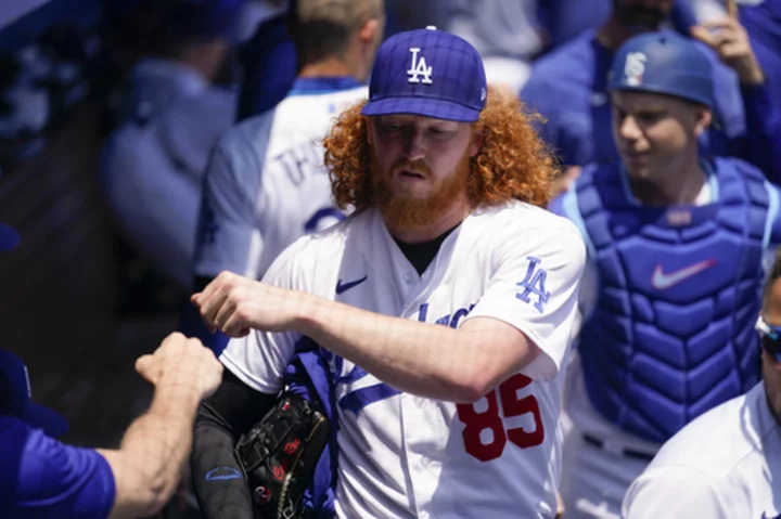 Dodgers' starter May headed back to IL due to right elbow pain