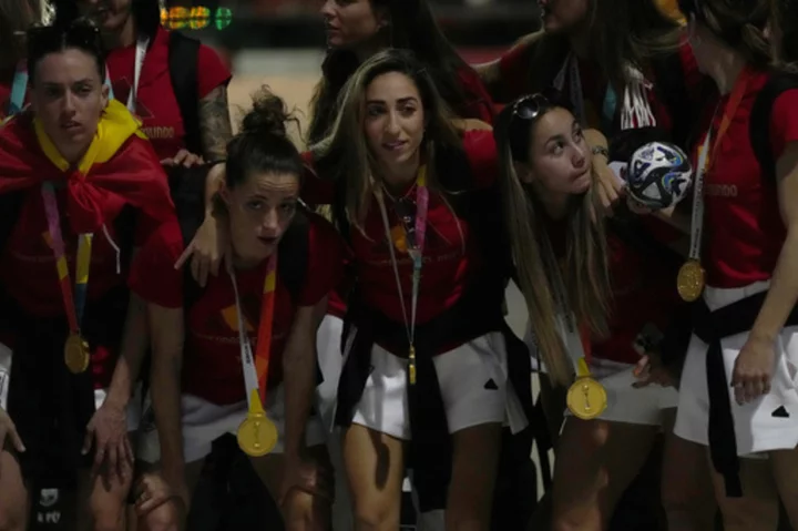 Spain celebrates Women's World Cup at home with Carmona remembering her late father