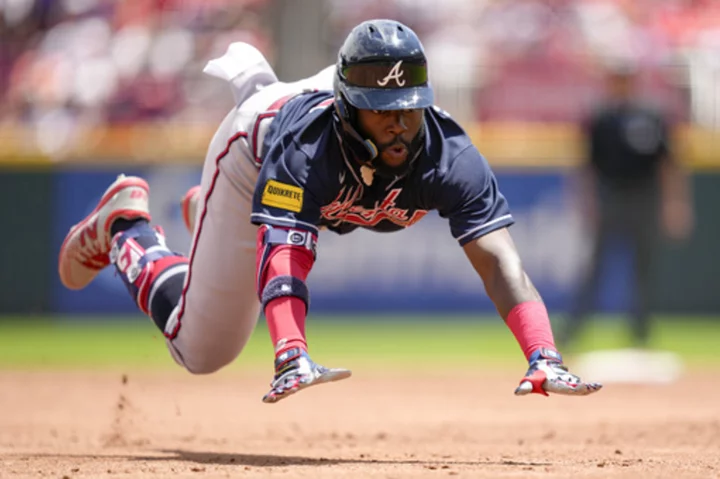 Olson's go-ahead homer helps Braves earn another wild 7-6 victory over the Reds