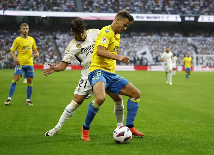 Soccer-Diaz and Joselu on target as wasteful Real sink Las Palmas