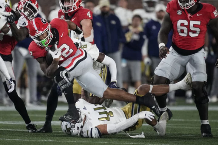 Milton runs for 156 yards and 2 TDs, No. 1 Georgia holds off Georgia Tech 31-23