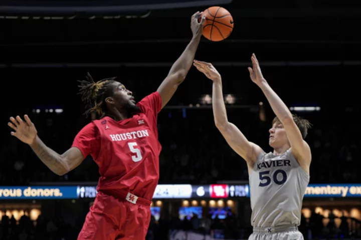 L.J. Cryer scores 23 points in No. 6 Houston's 66-60 over Xavier