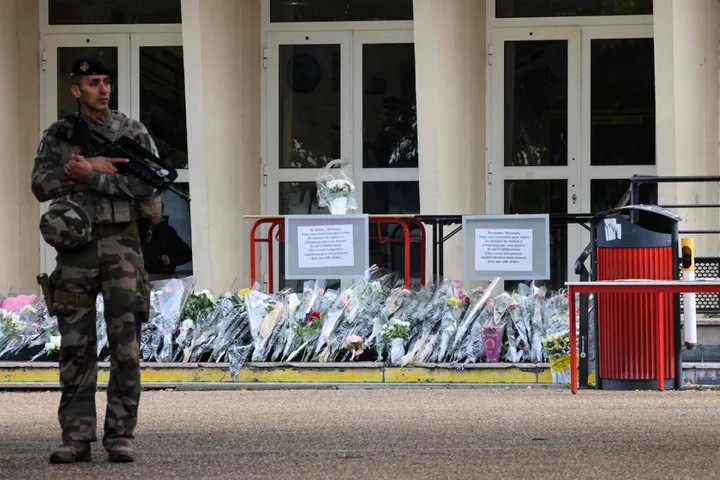 School where teacher was stabbed to death in France evacuated over bomb threat