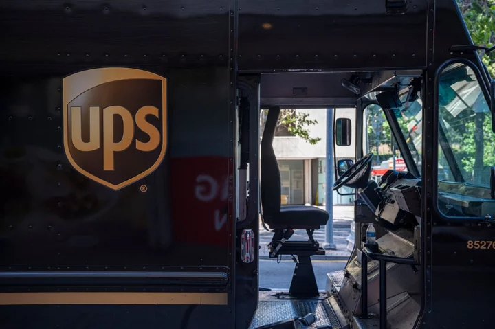 UPS Cuts Forecast With Costs Set to Rise After Union Deal