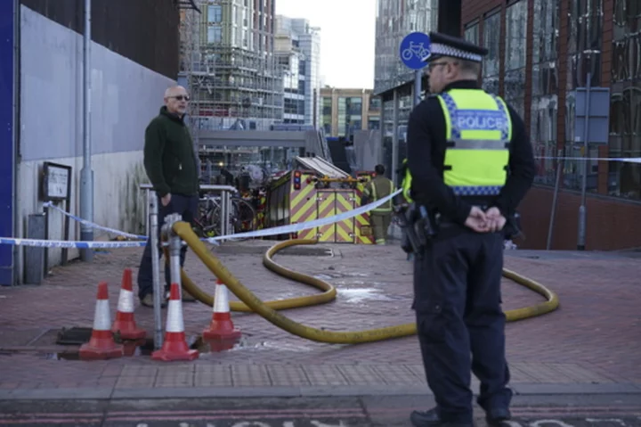 A crane operator has rescued a man from a burning high-rise in England