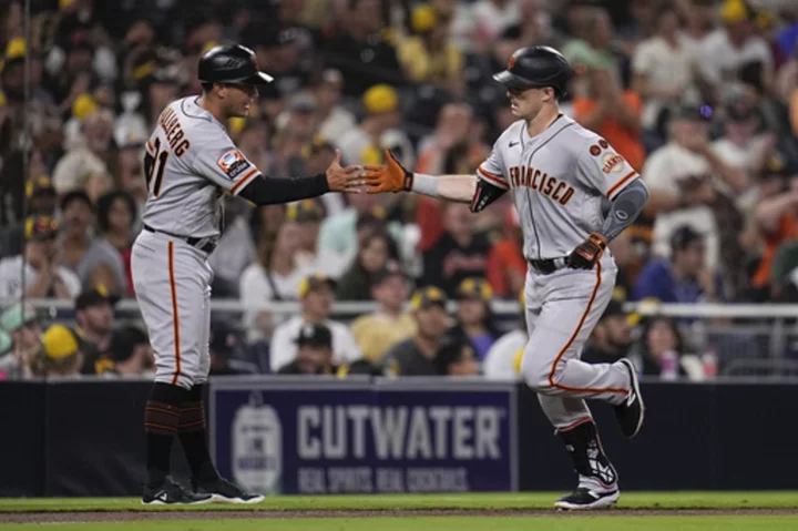 Yastrzemski homers and drives in 2 runs as the Giants beat the punchless Padres 7-2