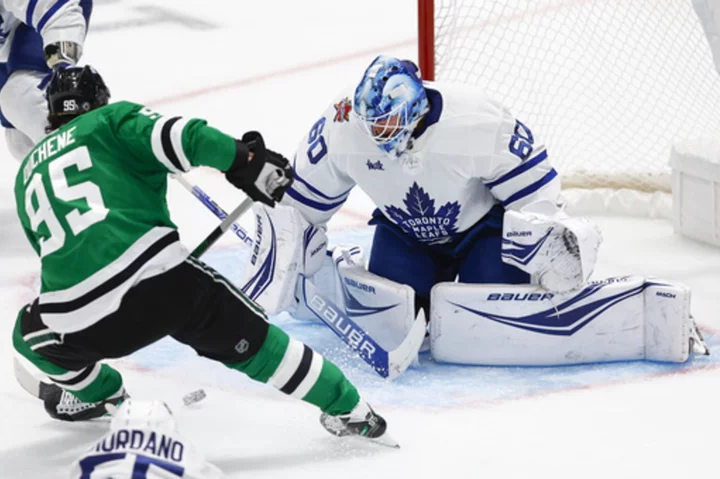 Backup goalie Woll earns the win, Rielly has a 2-point game as Maple Leafs beat Stars 4-1