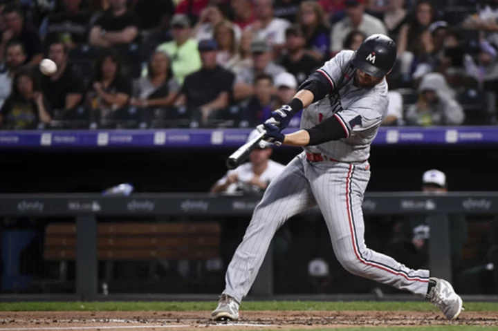 Larnach's grand slam leads Twins to 14-6 win over Rockies