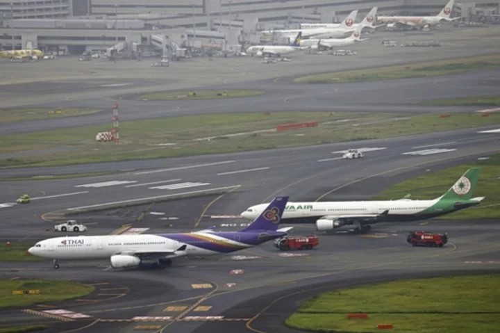 Runway closed at Tokyo's Haneda airport after 2 jets accidentally contact each other