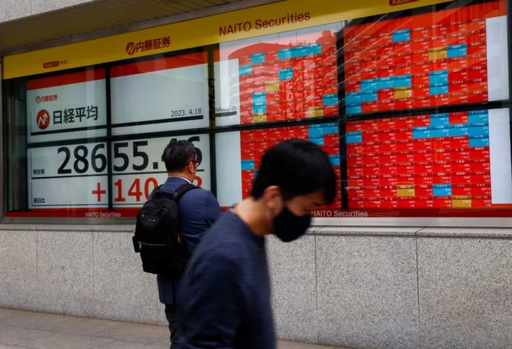 Asia stocks slide amid China woes, Japan catches up on chip sell-off