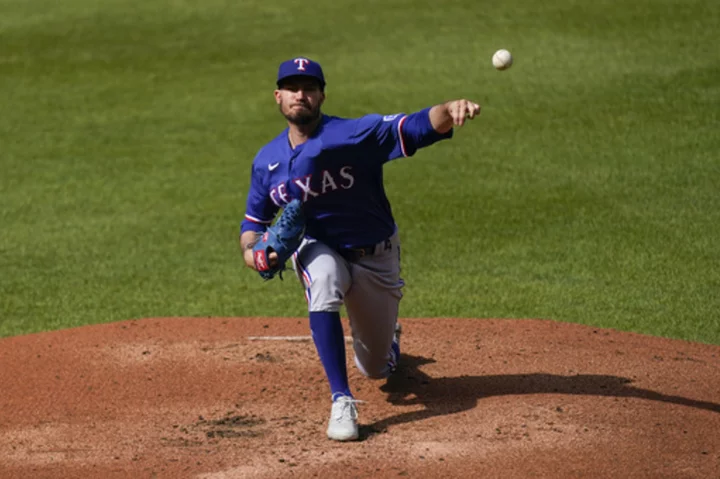 Heaney pitches 7 solid innings to help streaking Rangers beat Orioles 5-3