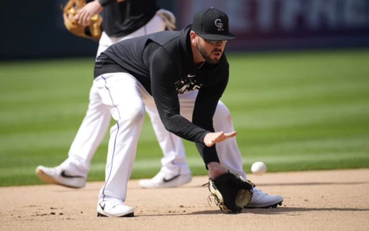 After blowout win in Denver, Angels acquire Mike Moustakas from Rockies