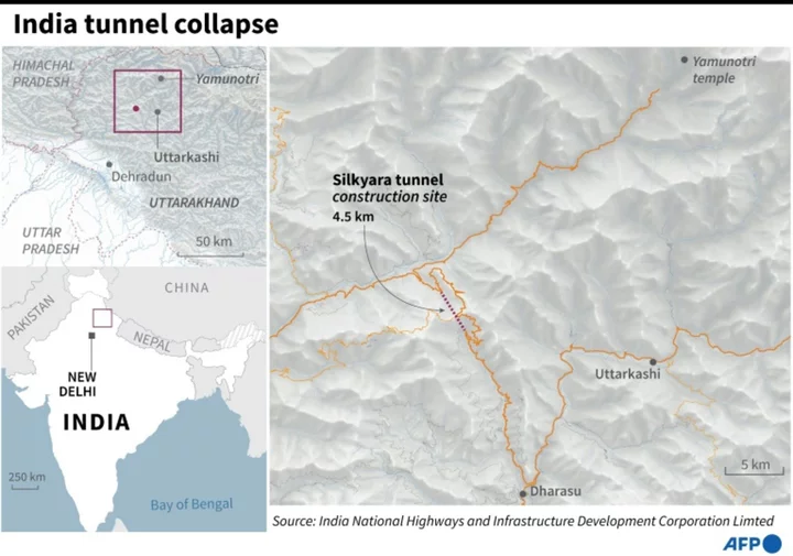 India tunnel rescue efforts paused over fears of cave-in