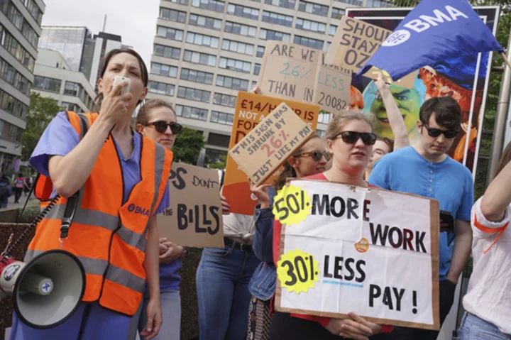 Tens of thousands of doctors in England start 'longest' strike in health system's history