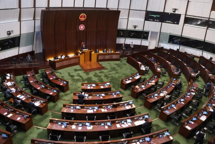 Hong Kong changes law to slash directly elected council seats, undermining democratic challenges