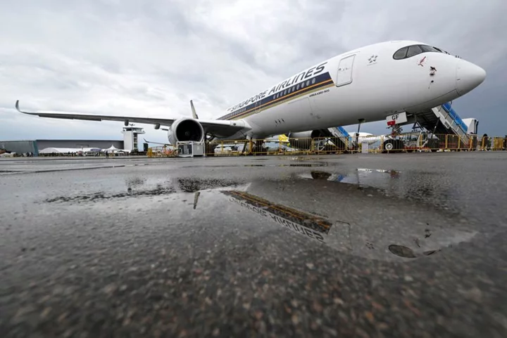 Singapore Airlines posts record half-year profit as air travel demand soars