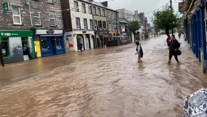 Watch: People wade through flooded streets as Storm Babet brings torrential rain to Ireland