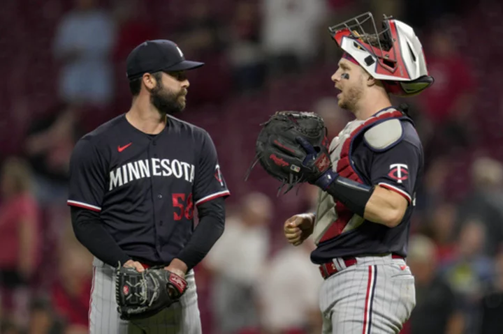 Castro homers, makes pair of spectacular catches to lead Twins over Reds 7-0