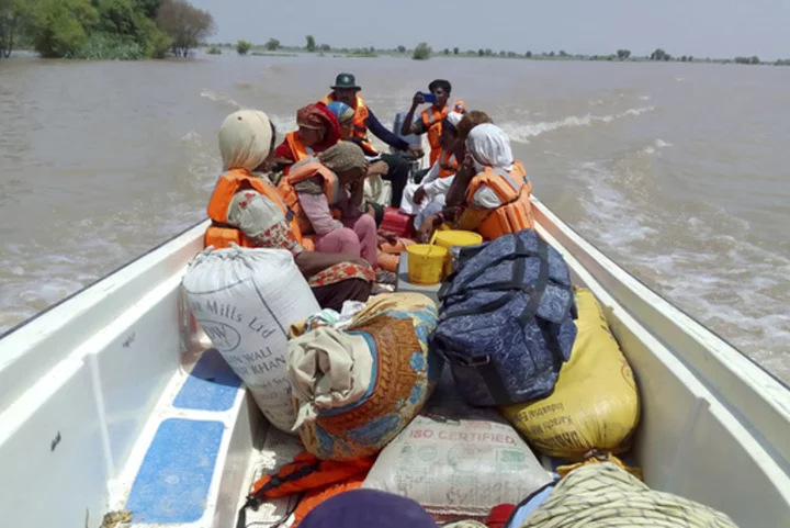 Rescuers evacuate over 100,000 people from flood-hit areas of Pakistan's Punjab province in 3 weeks