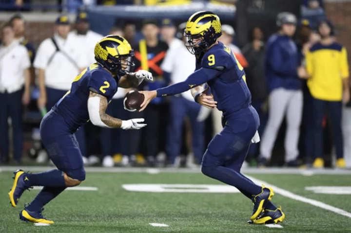 Blake Corum scores 2 TDs, helps No. 2 Michigan pull away to beat Bowling Green 31-6