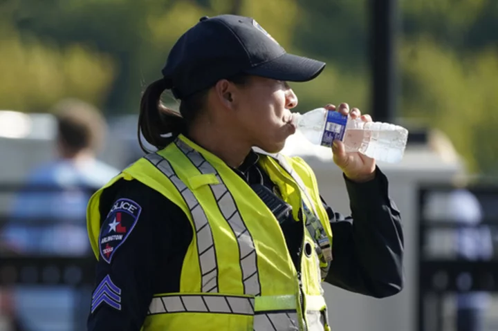 Sweltering temperatures bring misery to large portion of central U.S., setting some heat records