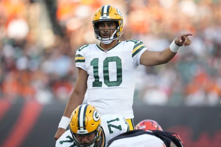 Love, Clifford help Bengals roll past Packers in preseason opener. Burrow watches from sideline