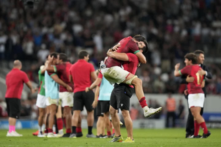 Portugal pulls off Rugby World Cup stunner and Fiji advances in storming end to pool stage