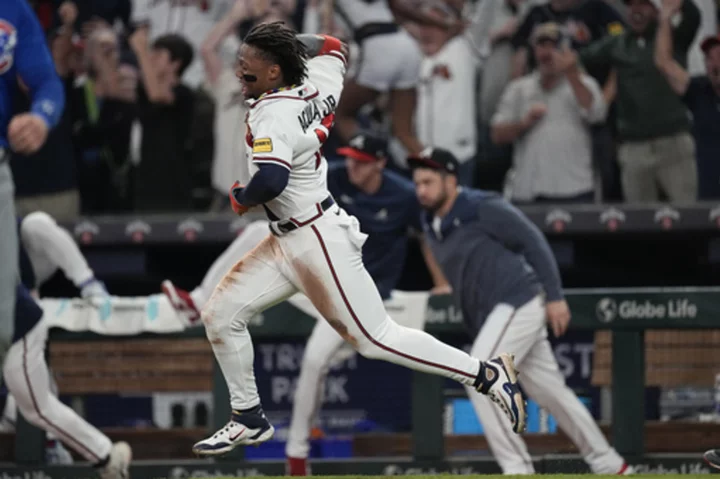 Acuña becomes first 40-70 player as Braves beat Cubs 6-5 in 10 innings