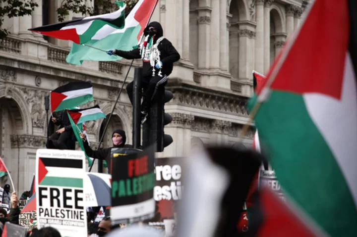 Tens of thousands of pro-Palestinian protesters march in London as Israel-Hamas war roils the world