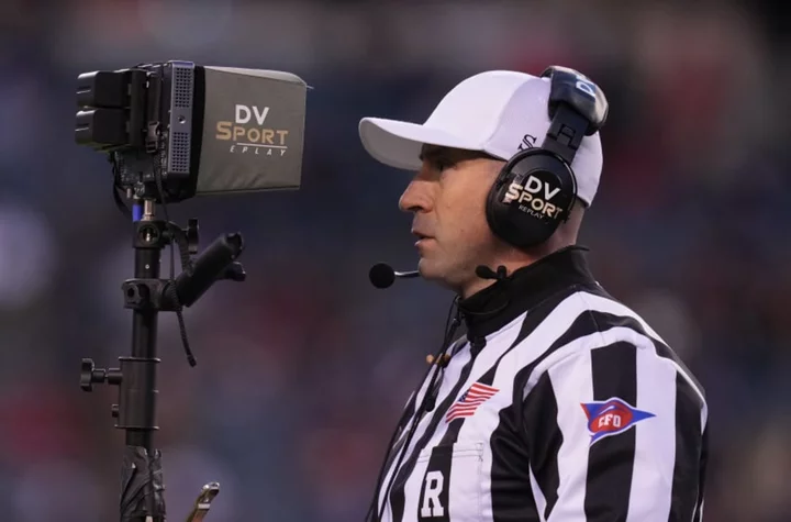 How much do college football referees make?