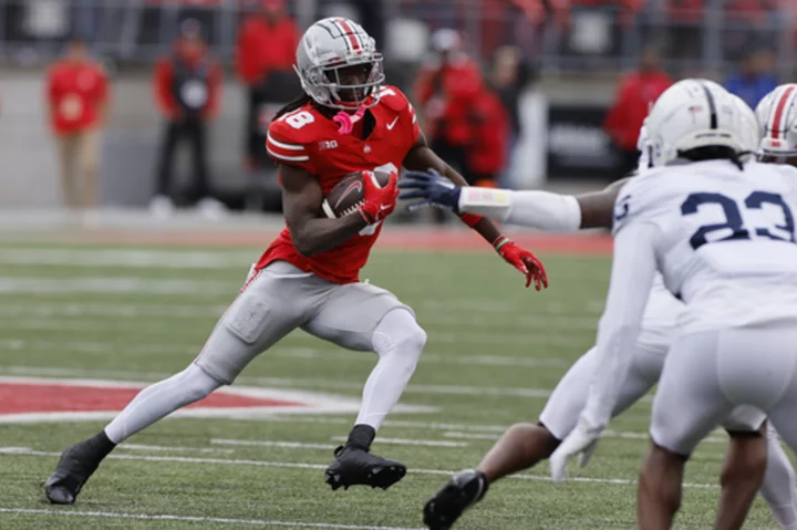 Harrison has a touchdown catch, No. 3 Buckeyes defense steps up big in 20-12 win over No. 7 Penn St