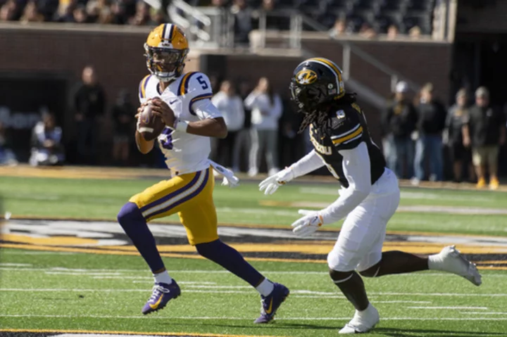 Jayden Daniels dazzles in rallying No. 23 LSU to 49-39 shootout win over No. 21 Missouri