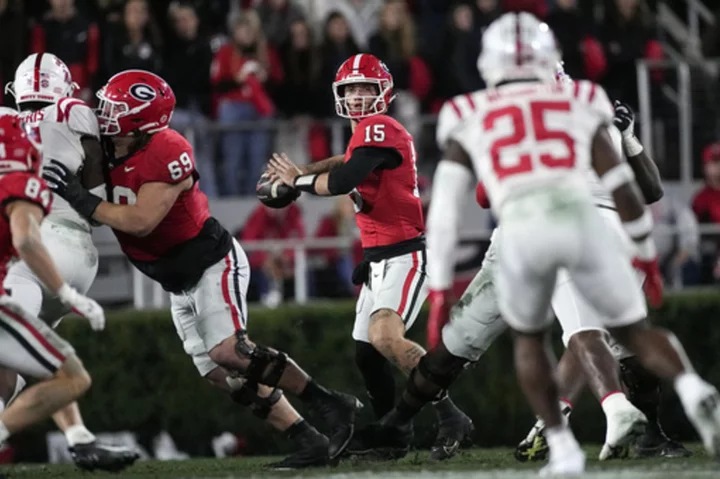 Bowers returns, No. 1 Georgia routs No. 10 Ole Miss 52-17 to punctuate another SEC East title